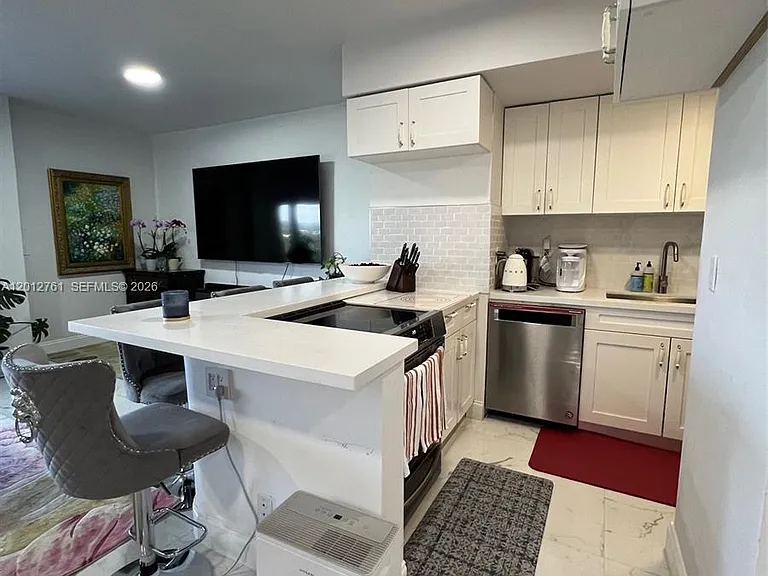 880 NE 69th St #11M — Photo 12