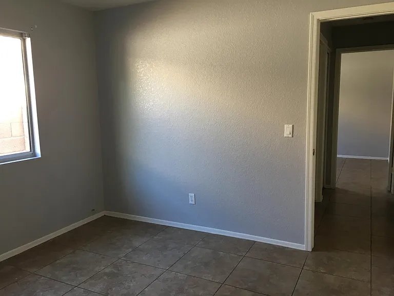 This bedroom has a nicely-sized closet.