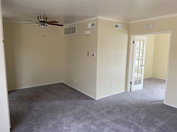 from entry
living, dining, door to bedroom