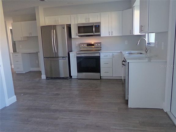 2nd image of 6795 Armand Pl N #4