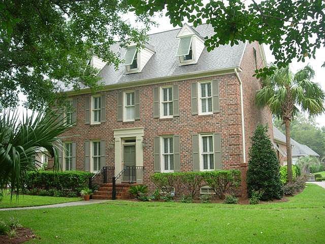 Stately Georgian 3 story brick home