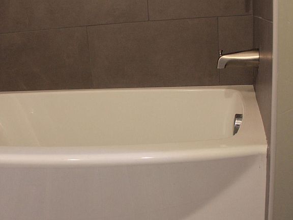 All new plumbing and bathtub area