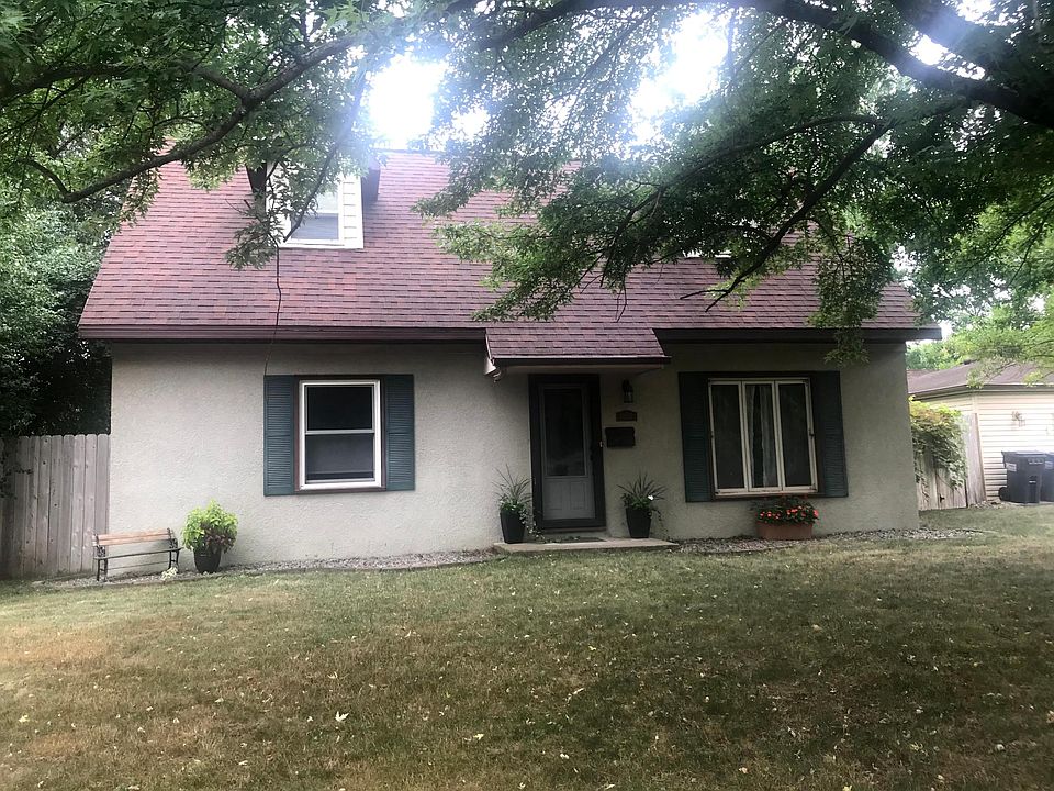 Front of the home with large shade trees providing cover from the west.