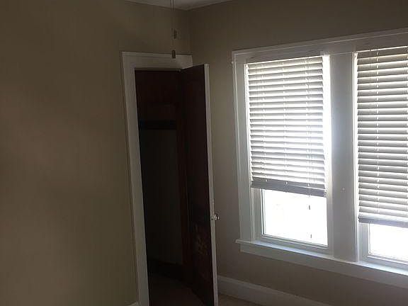 Bedroom with Carpet and walk-in closet plus ceiling fan