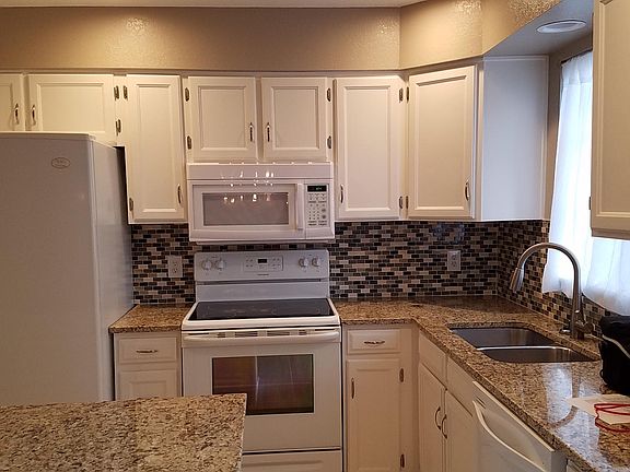 Modern kitchen with granite counter tops