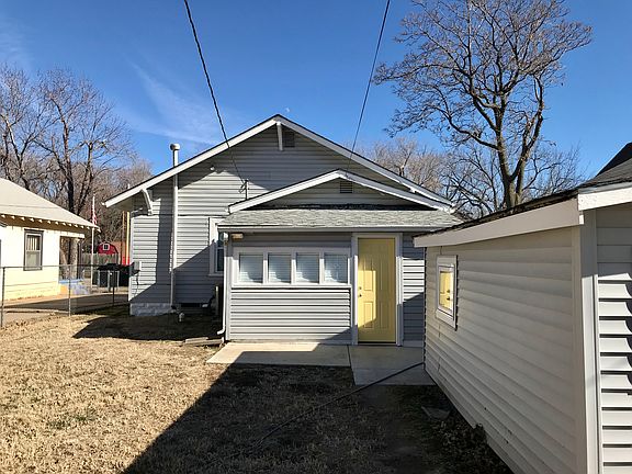 Backyard with patio & garage