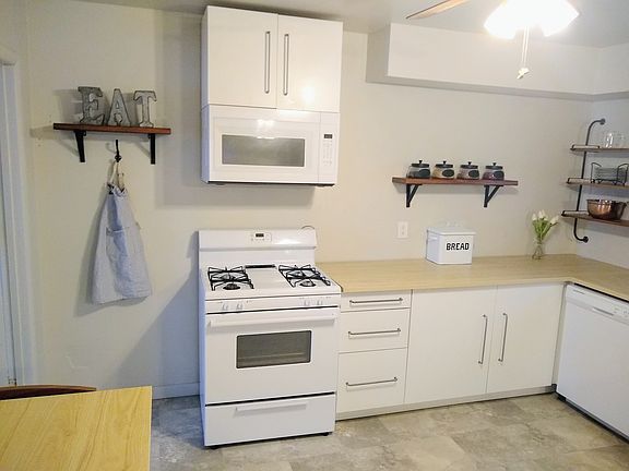 Gas oven and vented microwave