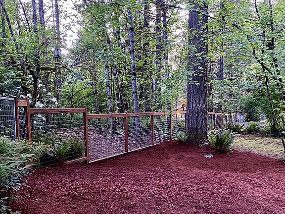 Large fenced back/side yard.