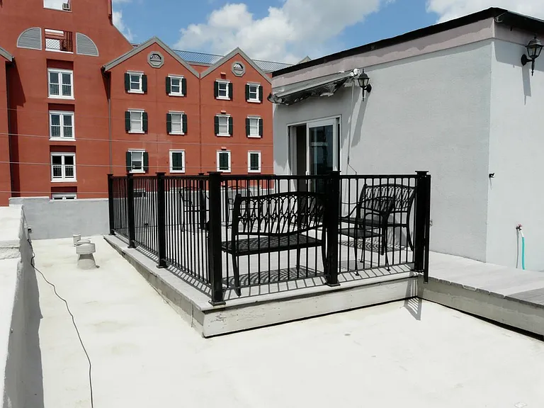 roof top deck with loft bed.
Role out canvas awning for shade