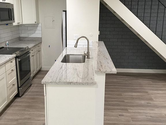 Standing in dining nook.