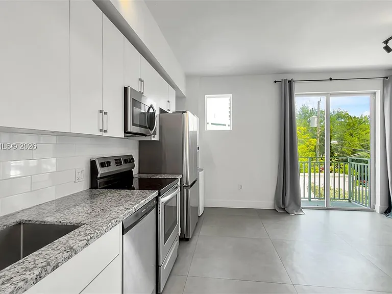 1536 NW 15th Ave #206 — Photo 1