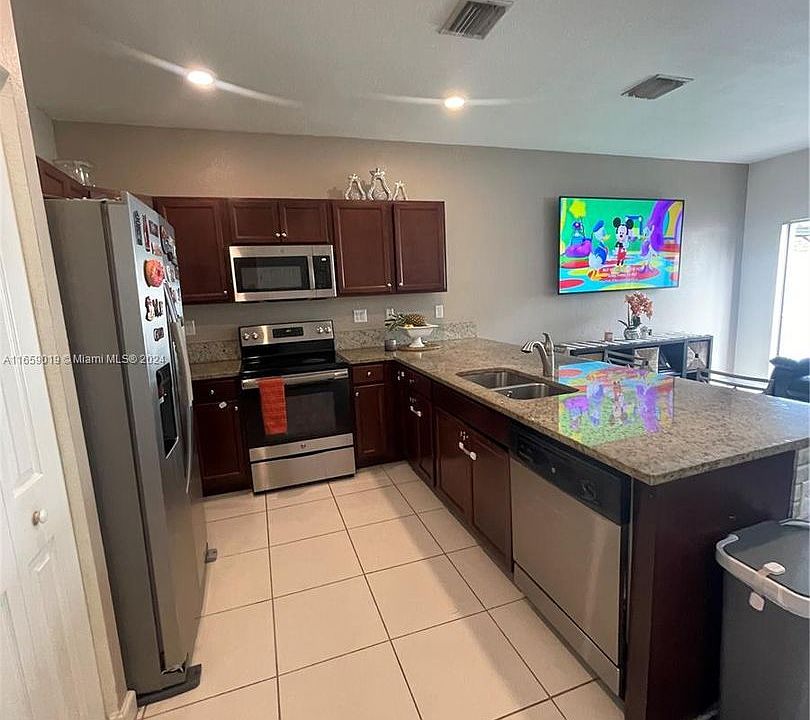 1st image of 9309 W 32nd Ln #9309