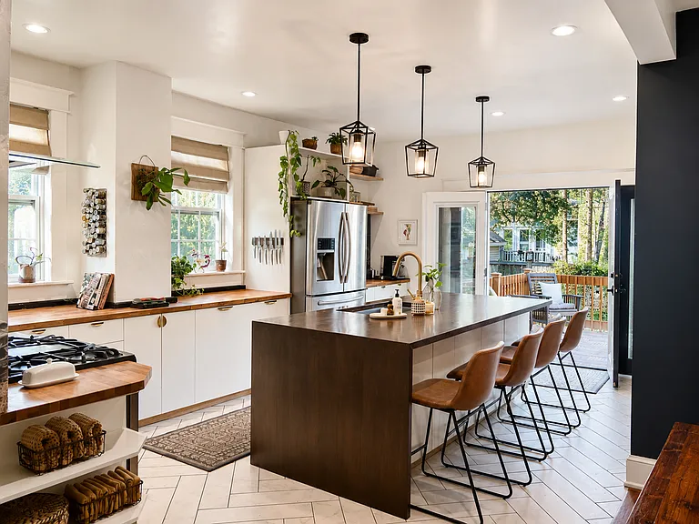 You will love this gourmet kitchen and its French doors which open to the backyard!