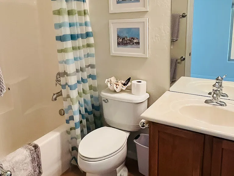 Family and guest bathroom right next to second bedroom.