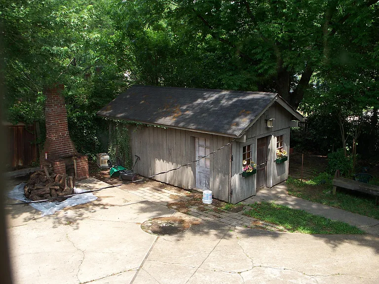 The Workshop & Barbecue Pit seen from the Upstairs Family Room on the Second Floor and over-looking the Driveway.