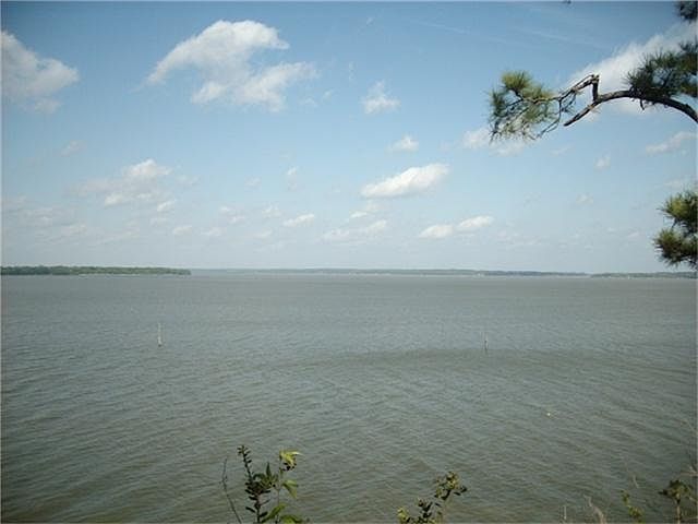  9 Acres Lake front on Open Lake with fantastic hill top view.