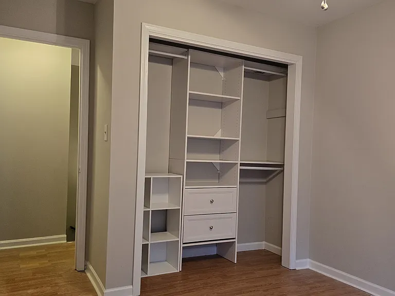 second bedroom upstairs with custom closet
