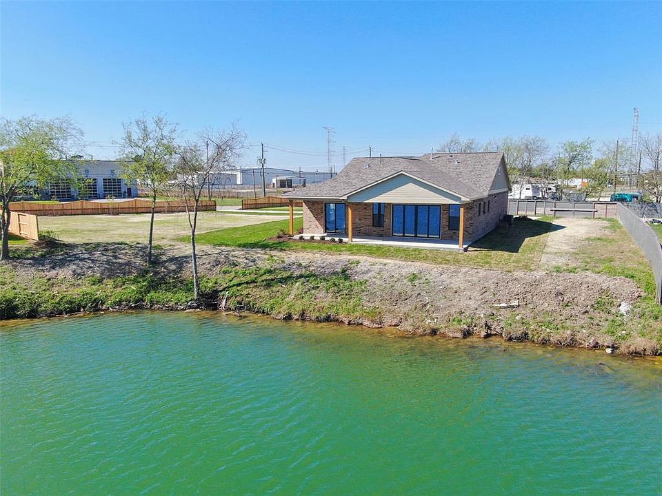 Waterfront on oversized 34K sf lot