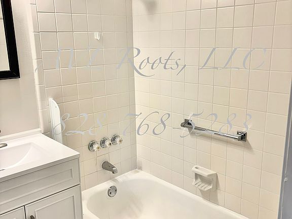 Right side hallway bathroom (typically shared by Bedroom #1 and Bedroom #2) has nice tub for soaking