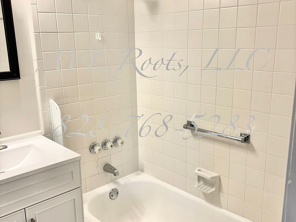 Right side hallway bathroom (typically shared by Bedroom #1 and Bedroom #2) has nice tub for soaking