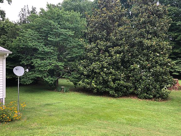 Backyard view from screened in porch.