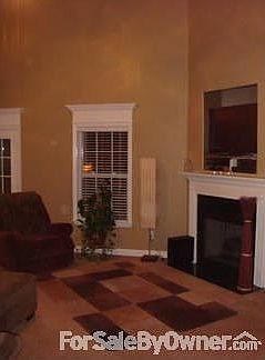 Living Room
						:
						18x17 with Fireplace. 18' ceiling