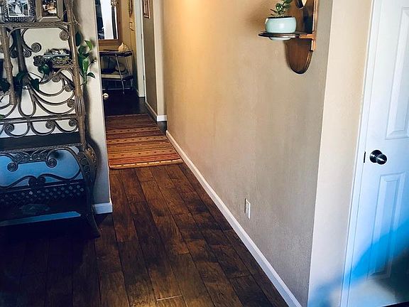 HALLWAY FROM ENTRYWAY TO LIVING ROOM