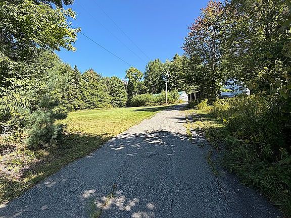 View up driveway to house