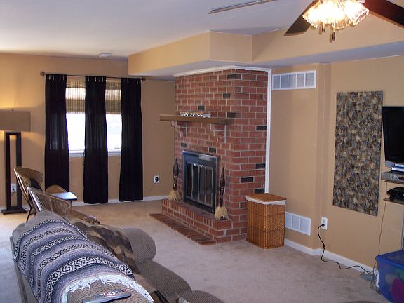 Large Living Room w/ Brick Fireplace