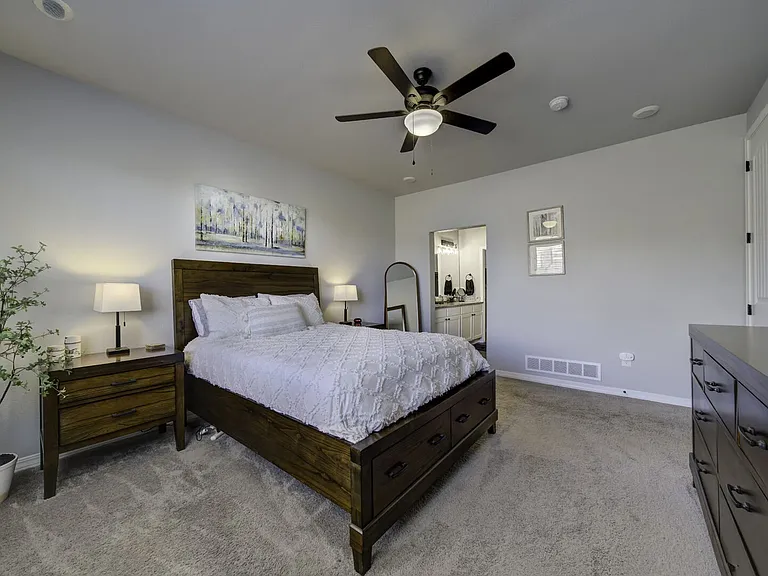 Master Bedroom
Primary suite offers a cozy queen bed