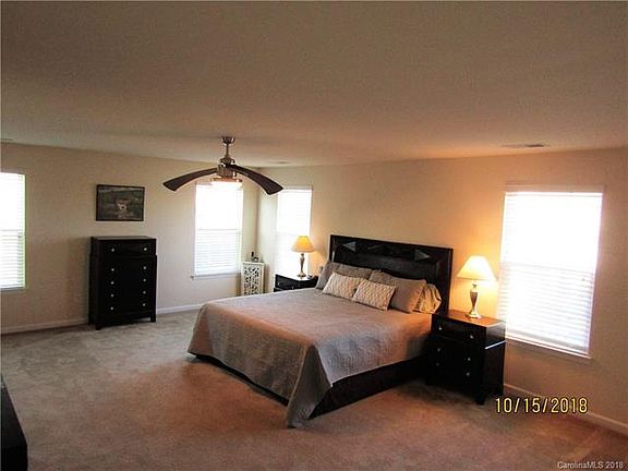 Tons of cabinets, huge pantry and island seating!
