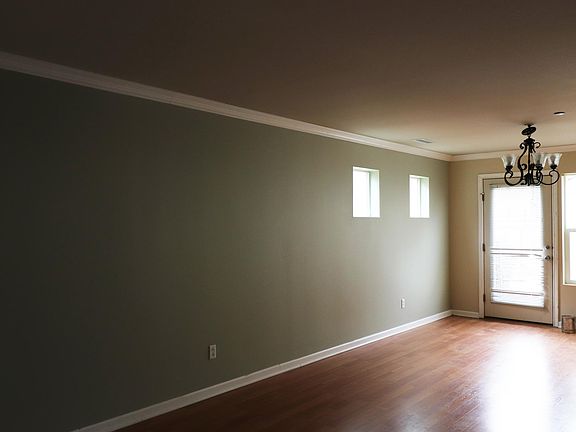 Living and dining room in warm and cozy colors