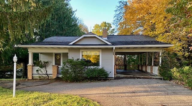 Front of house, showing carport/patio.