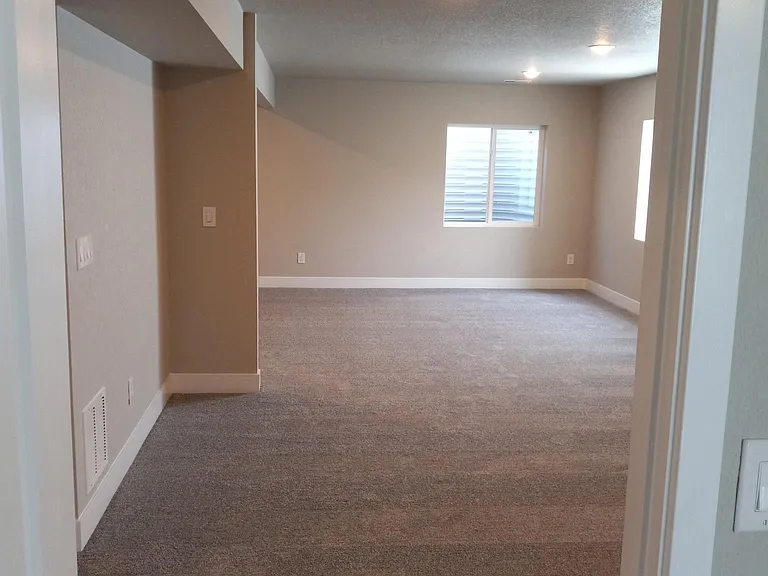 Rec Room from Bedroom 3, two large waist-level windows