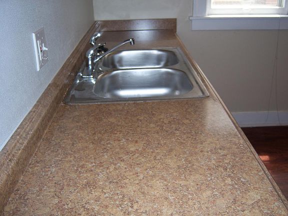 New countertops with new sink and faucets