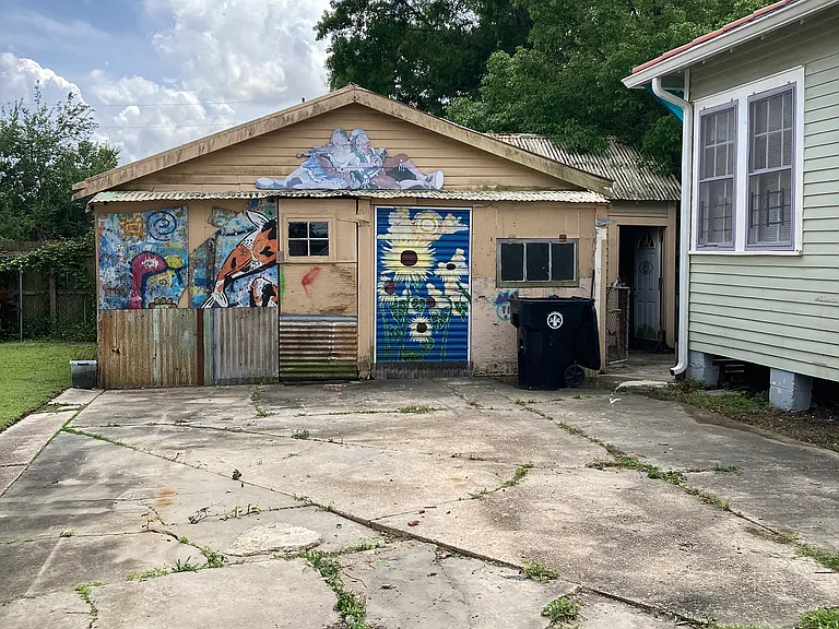 Large detached shed. Can be used as a studio, workshop, etc. One room finished, one not. Washer and dryer too.