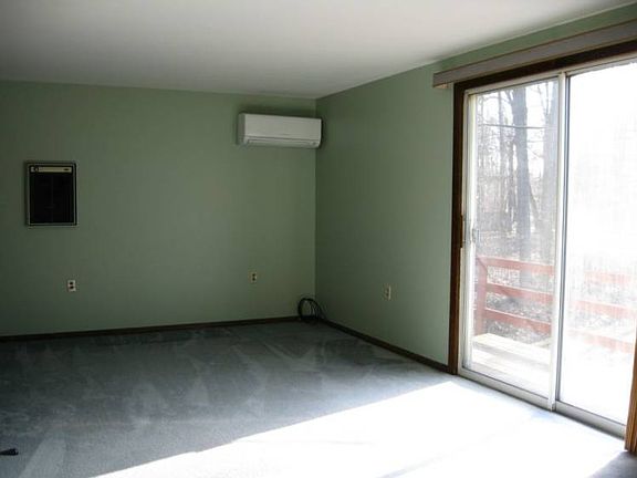 back bedroom with new patio doors with a 