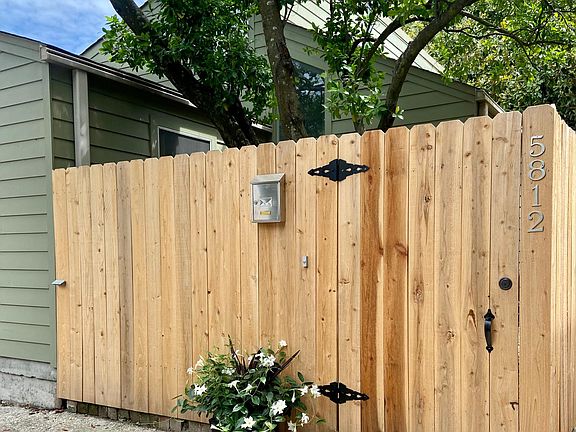 Fenced entry to private yard