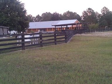 partially fenced & 2 stall barn