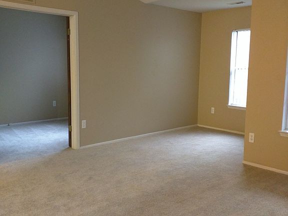 Large Bay Windows and Foyer in Living Room!