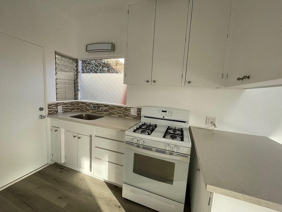 Newly renovated kitchen. Clean, white, and brand new!