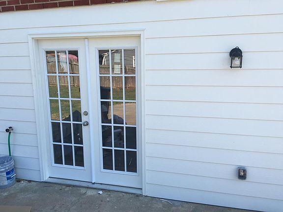 entrance to Unit B located in the rear of the house