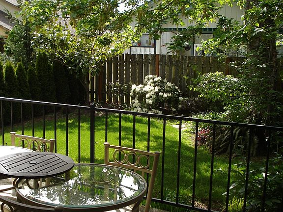 Covered patio with view of yard