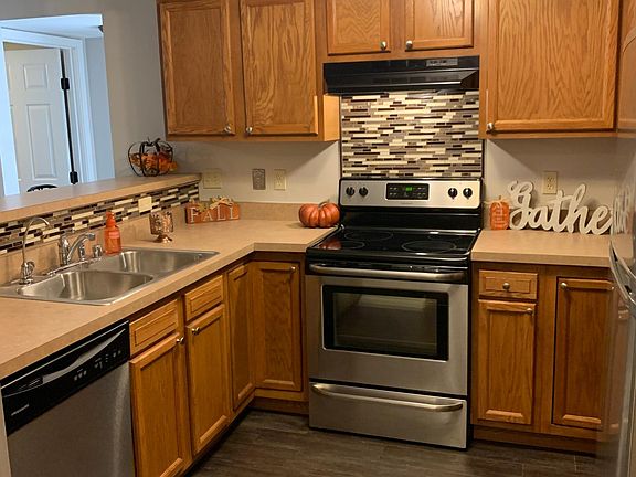 Sleek vinyl flooring, modern backsplash