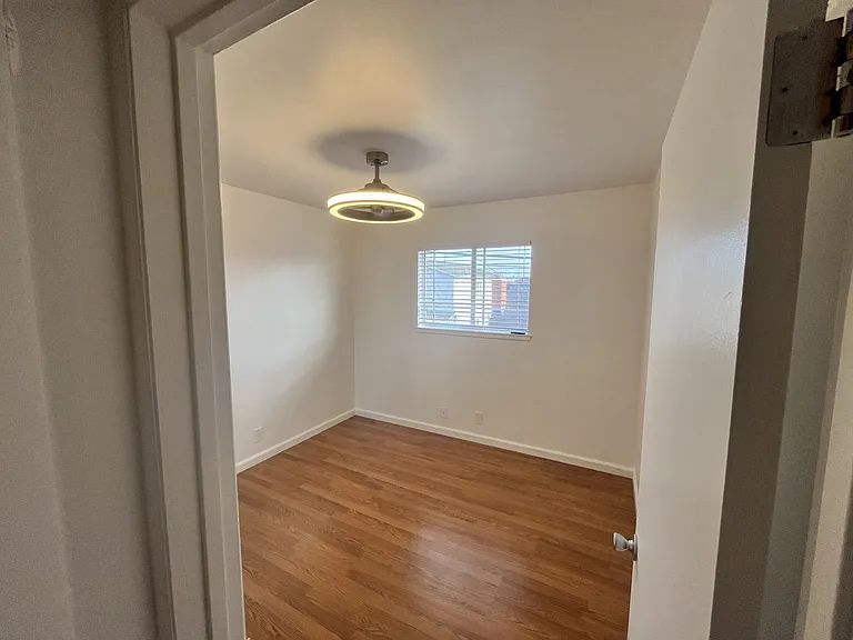 Nice 2nd bedroom, closet, ceiling fan/light, laminate flooring, white white