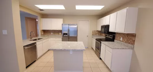 Beautiful granite kitchen with updated fixtures and appliances. - 306 Greener Dr