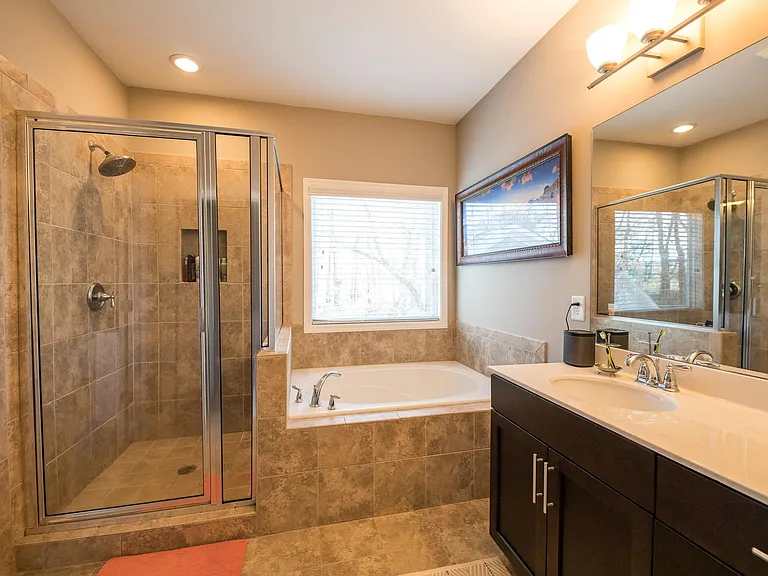 Separate soaking tub and shower, as well as separate water c