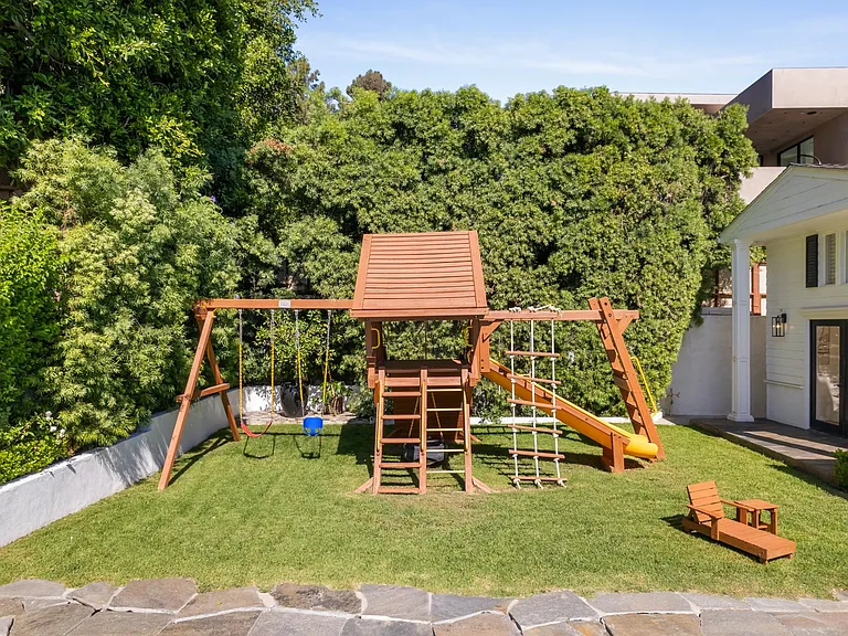 Delight in open-air fun with the jungle gym, providing a dynamic and enjoyable space for outdoor activities.