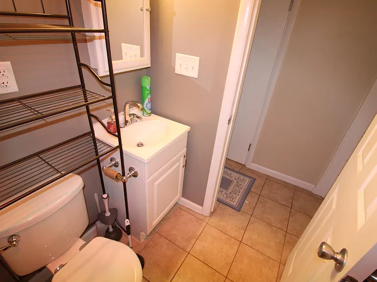 Tiled Bathroom and hallway for easy cleaning