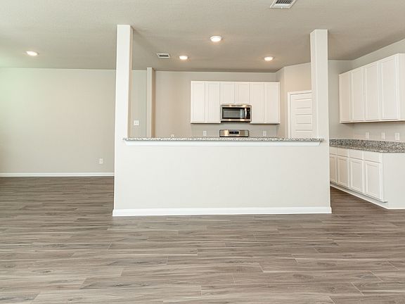 Family Room to Kitchen and Dining Area